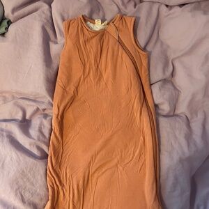 Size 0-6 (small) Sleep Bag in terracotta.